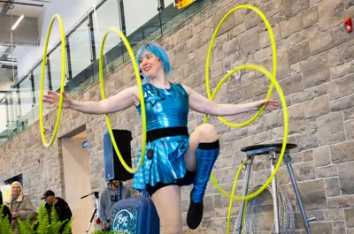 Gymnast performing on stage.