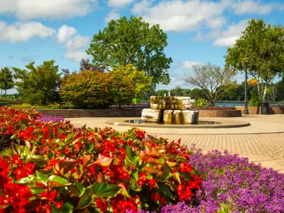 Water fountain surrounded by flowers at LaSalle Landing.