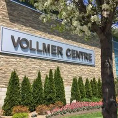Vollmer Centre sign ground view.