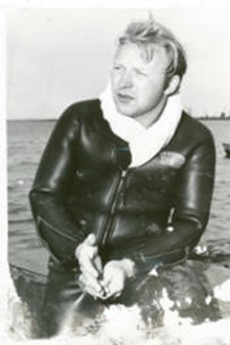 old photo of man in divers suit