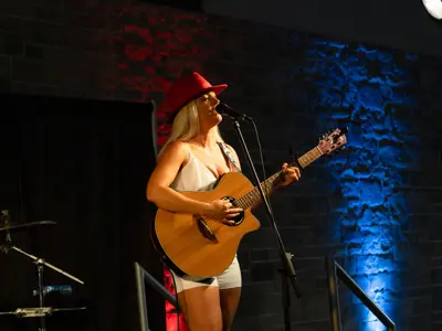 A guitarist on stage.