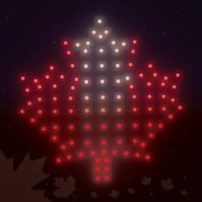 Maple leaf made of glowing red and white lights.
