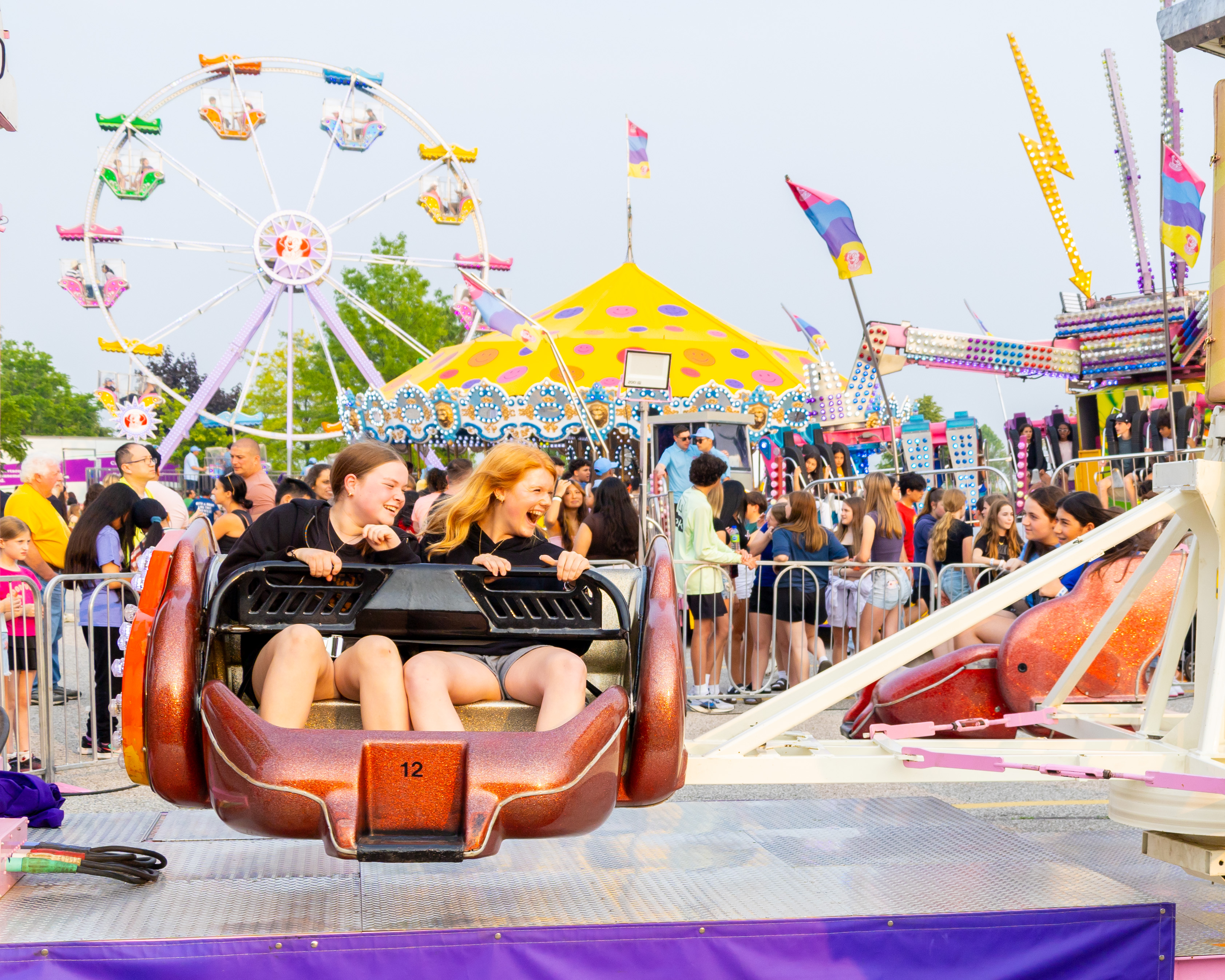 Children on a carnival ride.