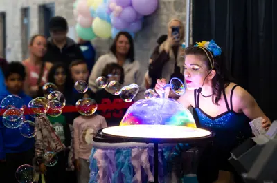 Bubble blowing entertainment.