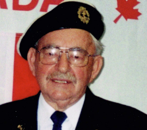Martin Bondy in front of the Canada Flag in uniform