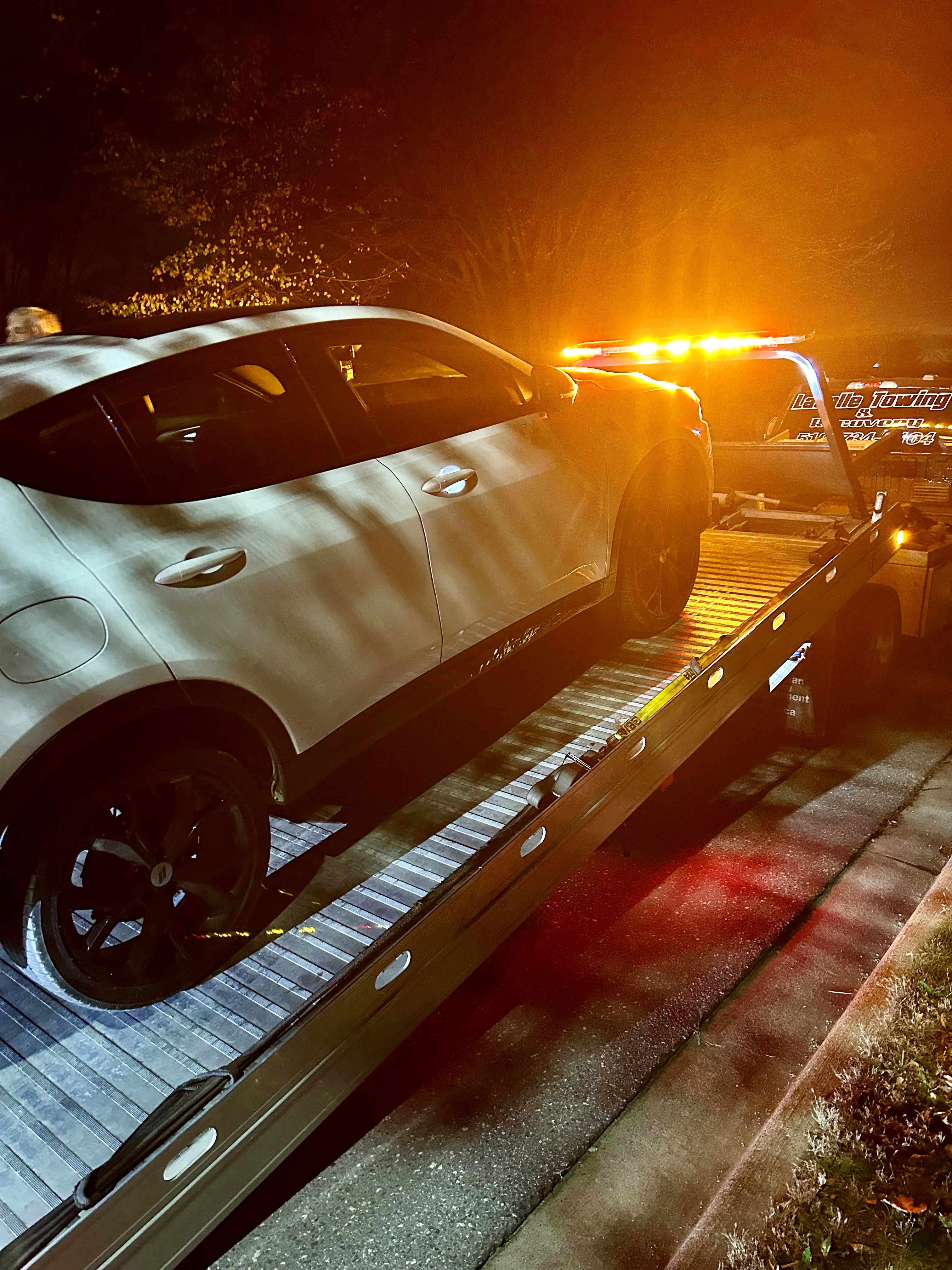 involved vehicle on tow truck bed