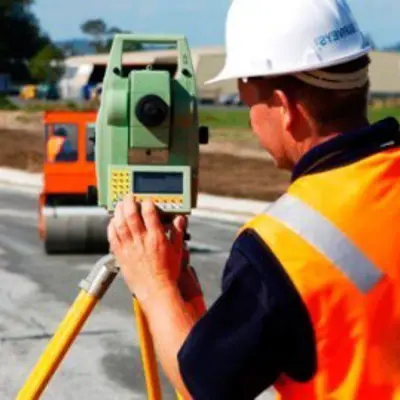 Surveyor using a total station