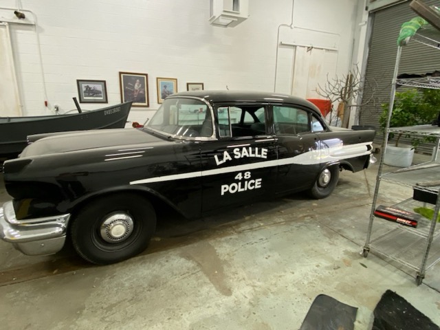 Black car with letters