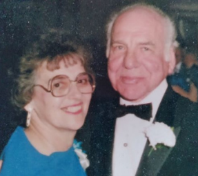 Marc Renaud and wife smiling