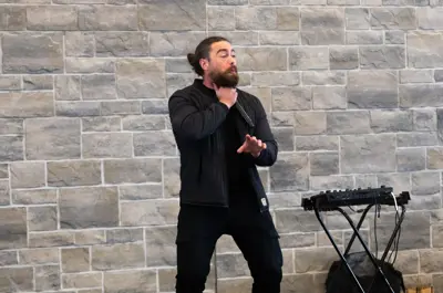 Performer holding a microphone.